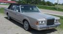 1989 Silver Frost /Titanium Lincoln Town Car (1LNBM81F5KY) with an V8 engine, Automatic transmission, located at 1725 US-68 N, Bellefontaine, OH, 43311, (937) 592-5466, 40.387783, -83.752388 - 1989 LINCOLN LUXURY TOWN CAR 5.0L V8, AUTO, Midnight Black Carriage Roof, Silver Frost -Titanium leather 6-way twin comfort recliner driver & passenger seats, AM/FM/CASS, Power Antenna, PW, PL, Power Deck Release, Tilt Steering Fingertip Speed Control, Wire Wheel Covers. - Photo#2